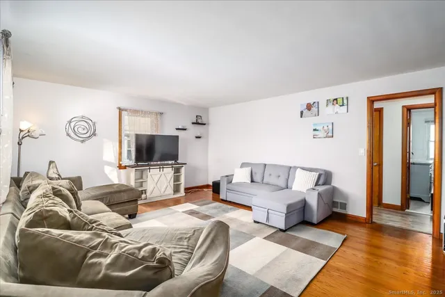 a living room with furniture and a couch