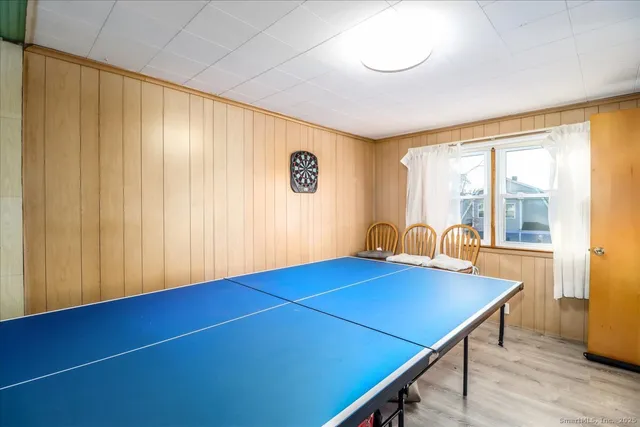 a view of table and chair with wooden floor