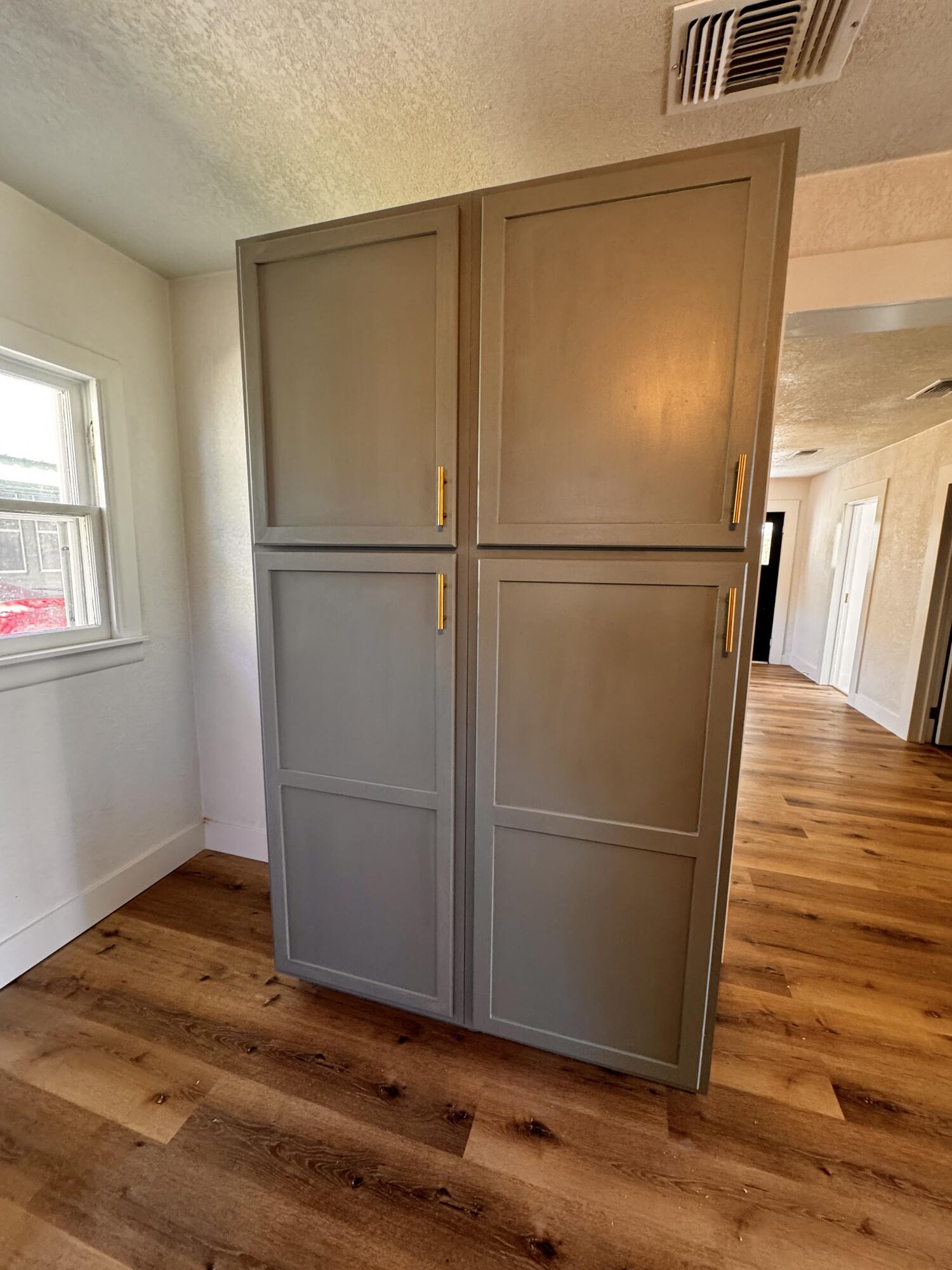 1001 Lexington Plainview, TX 79072 - Photo 15 of 31 a view of wooden floor in an empty room