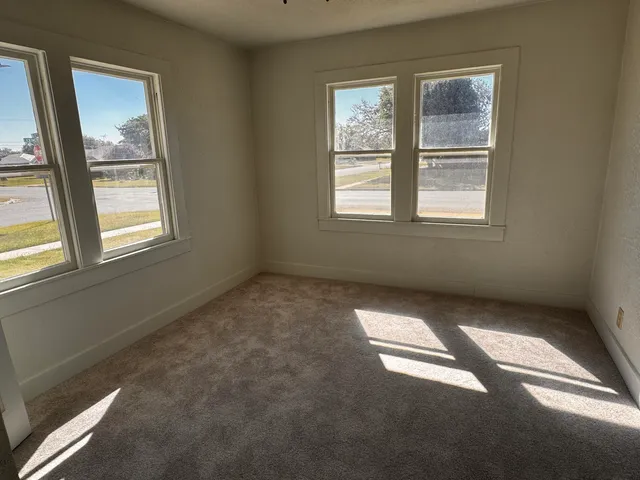an empty room with windows