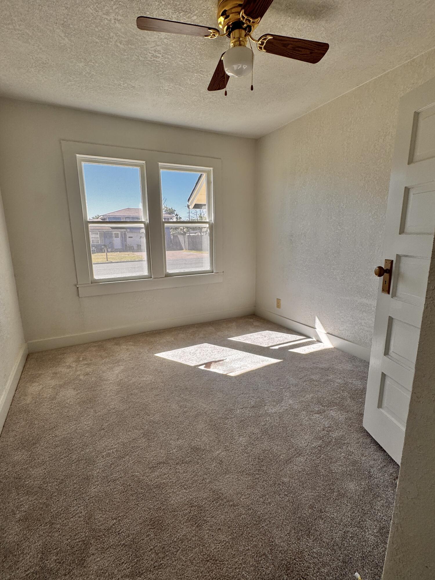 1001 Lexington Plainview, TX 79072 - Photo 24 of 31 an empty room with a window