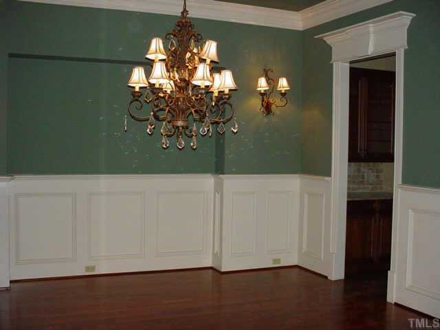 3208 Cotten Road, Unit LOT89 Raleigh, NC 27603 - Photo 2 of 12 a view of a chandelier fan and wooden floor