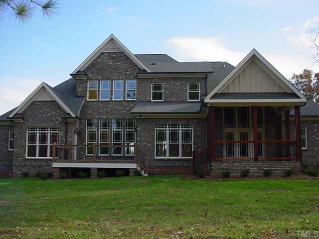 3208 Cotten Road, Unit LOT89 Raleigh, NC 27603 - Photo 6 of 12 front view of a house with a yard