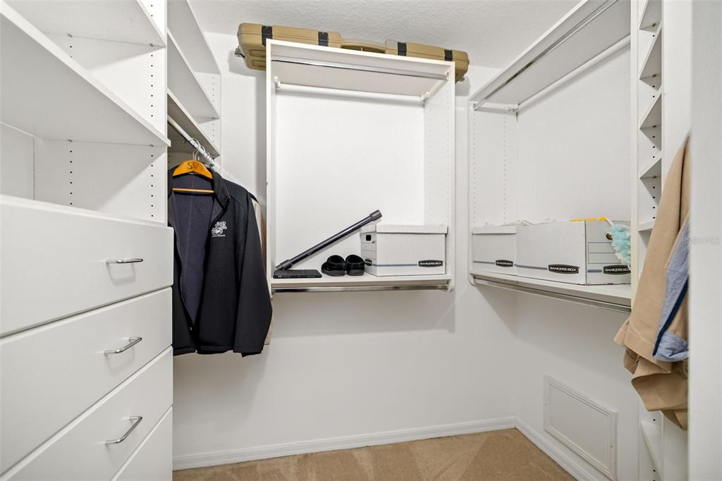 7631 Desert Inn Way Lakewood Ranch, FL 34202 - Photo 45 of 100 a view of storage and utility room with washer and dryer