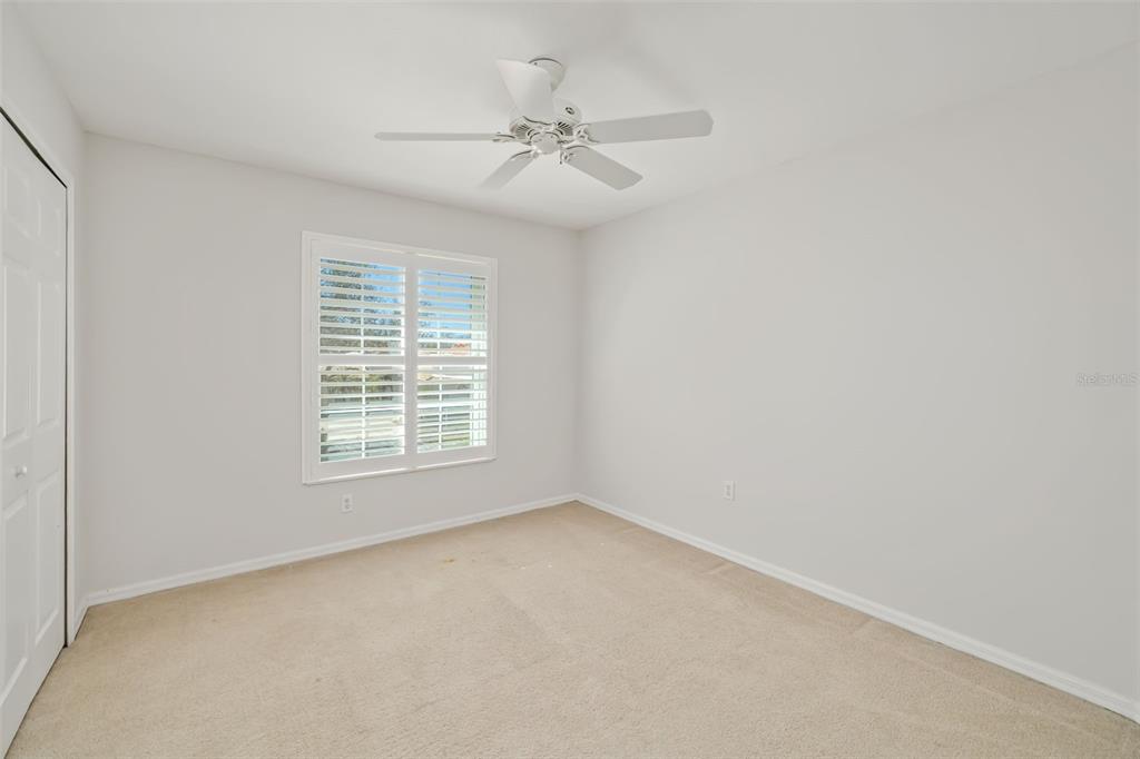 7631 Desert Inn Way Lakewood Ranch, FL 34202 - Photo 50 of 100 an empty room with a window