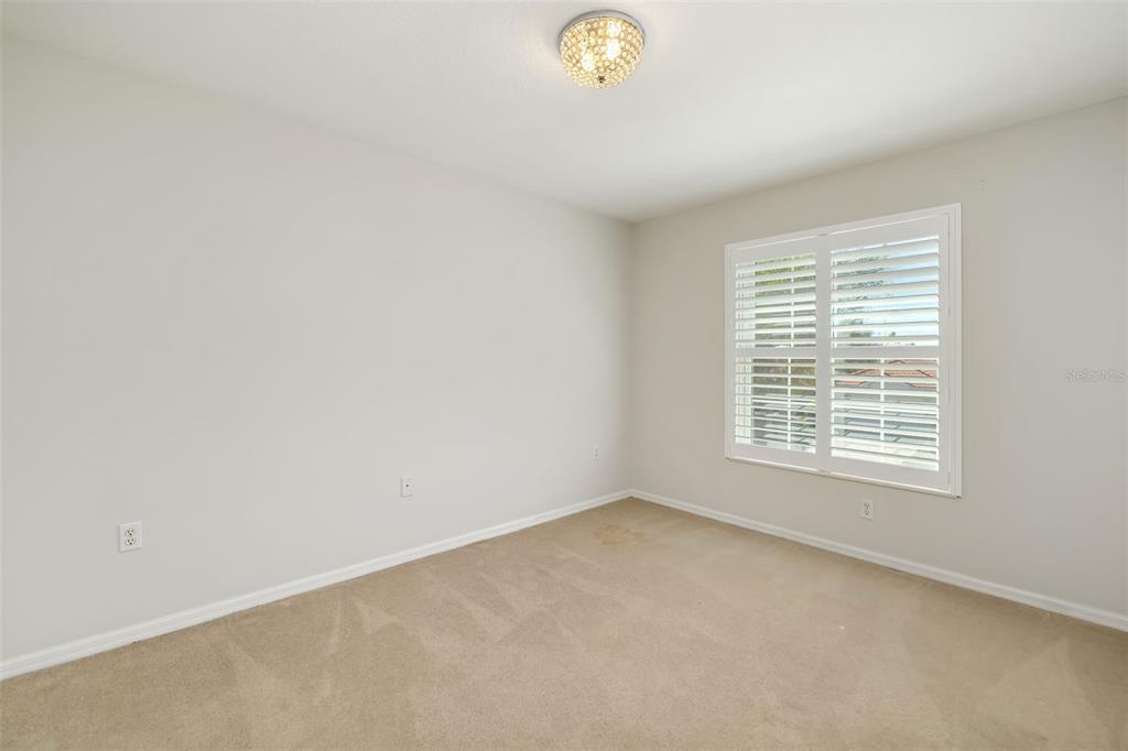 7631 Desert Inn Way Lakewood Ranch, FL 34202 - Photo 52 of 100 a view of an empty room with a window