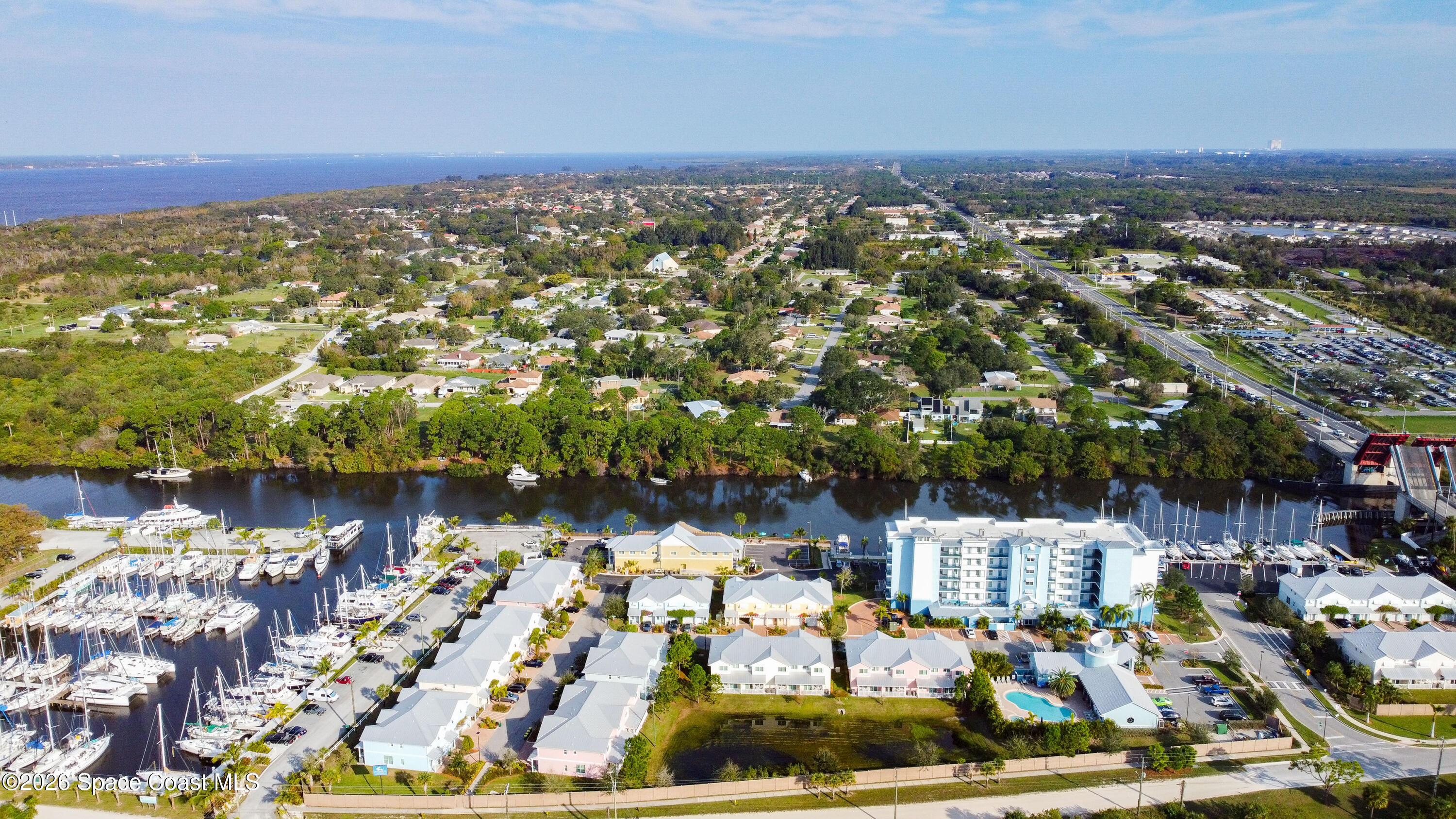 2709 Cutlass Point Lane, Unit 103 Merritt Island, FL 32953 - Photo 29 of 31 an aerial view of residential houses with outdoor space