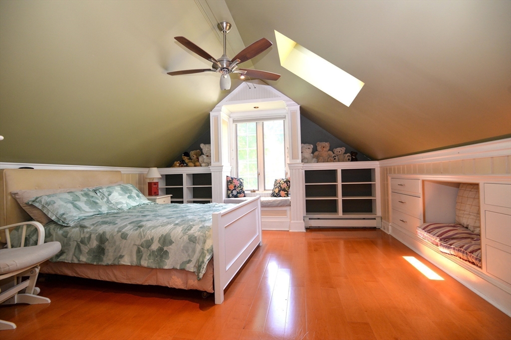 31 Sumner Road Brookline, MA 02445 - Photo 13 of 26 a bedroom with a bed and a large window