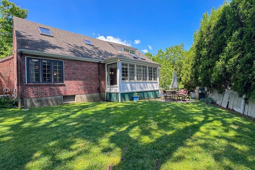 31 Sumner Road Brookline, MA 02445 - Photo 22 of 26 a view of a house with a backyard