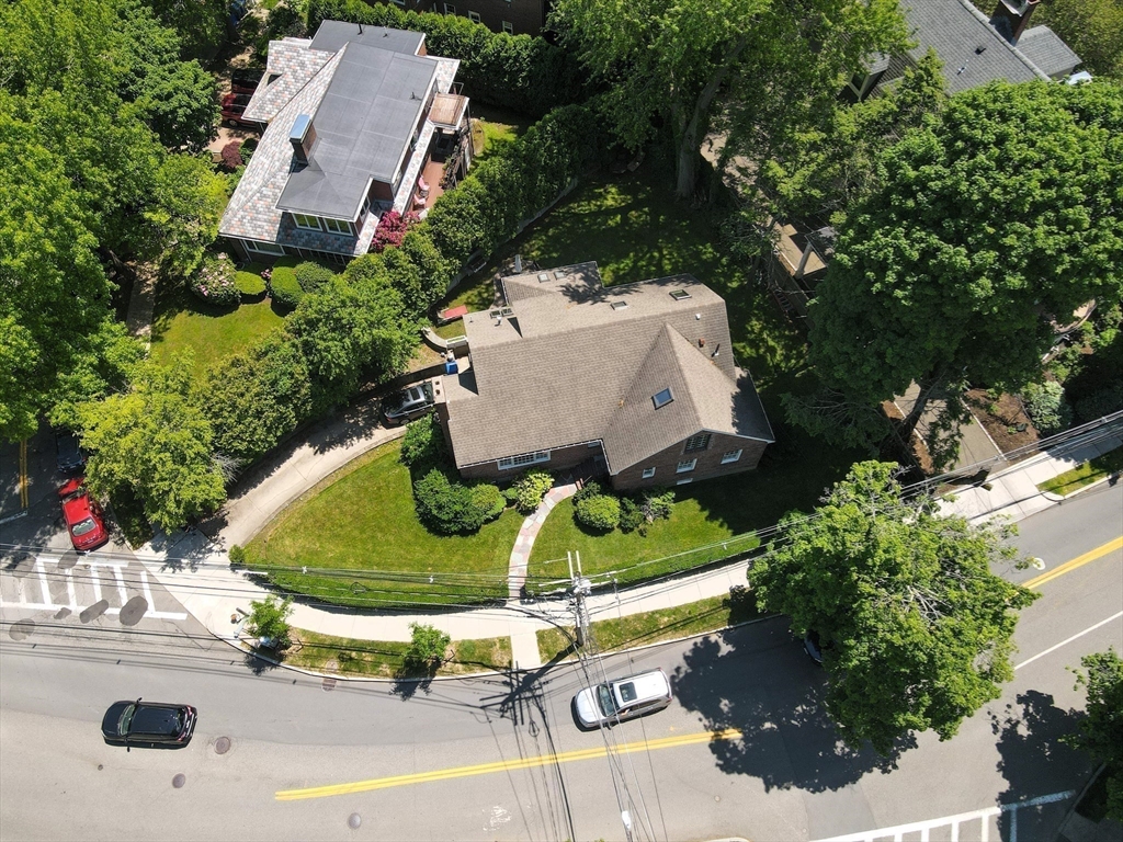 31 Sumner Road Brookline, MA 02445 - Photo 25 of 26 an aerial view of a house with yard swimming pool and outdoor seating