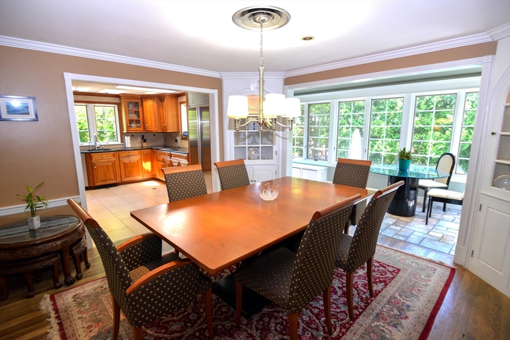 31 Sumner Road Brookline, MA 02445 - Photo 6 of 26 a view of a dining room with furniture window and outside view