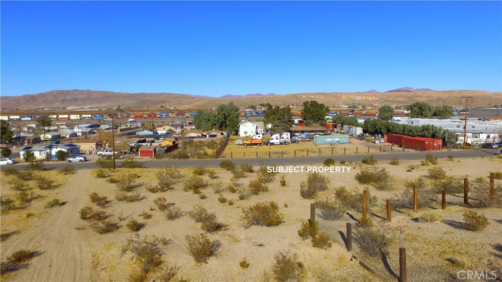 42424137 Armory Road Barstow, CA 92311 - Photo 7 of 30 a view of a city with mountains in the background