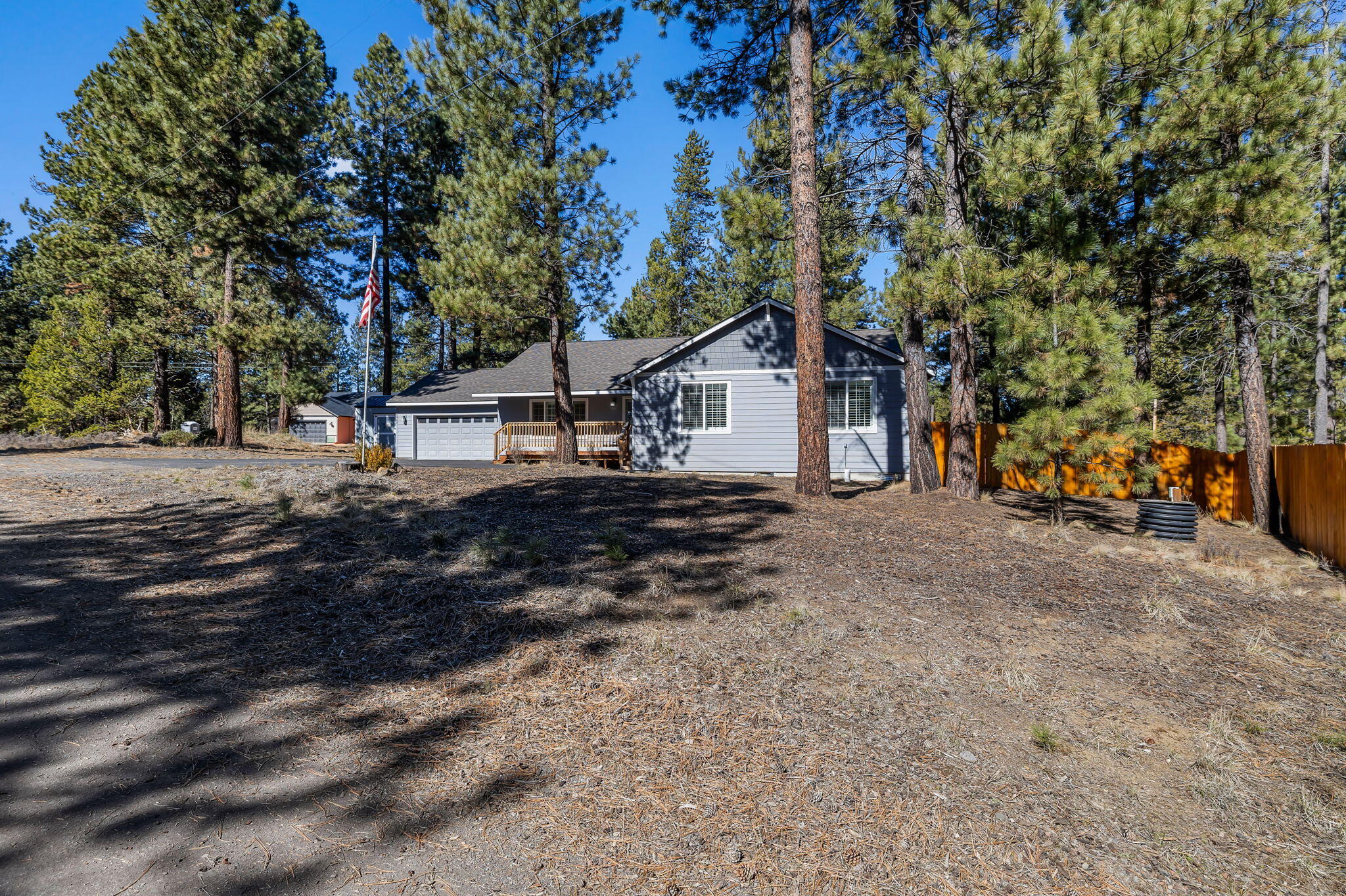 17064 Sacramento Road Bend, OR 97707 - Photo 33 of 50 a view of a house with a trees