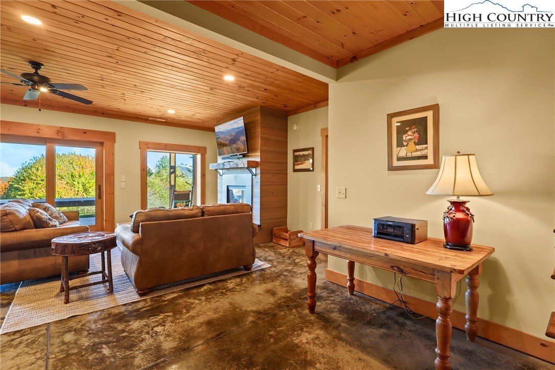 584 Grey Fox Ridge Road Banner Elk, NC 28604 - Photo 25 of 50 a living room with furniture and a window