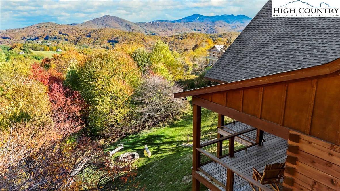 584 Grey Fox Ridge Road Banner Elk, NC 28604 - Photo 38 of 50 a view of a backyard with sitting area