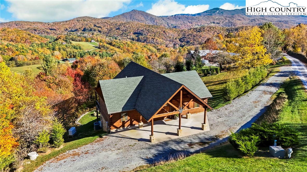 584 Grey Fox Ridge Road Banner Elk, NC 28604 - Photo 5 of 50 an aerial view of a residential houses and wooden fence