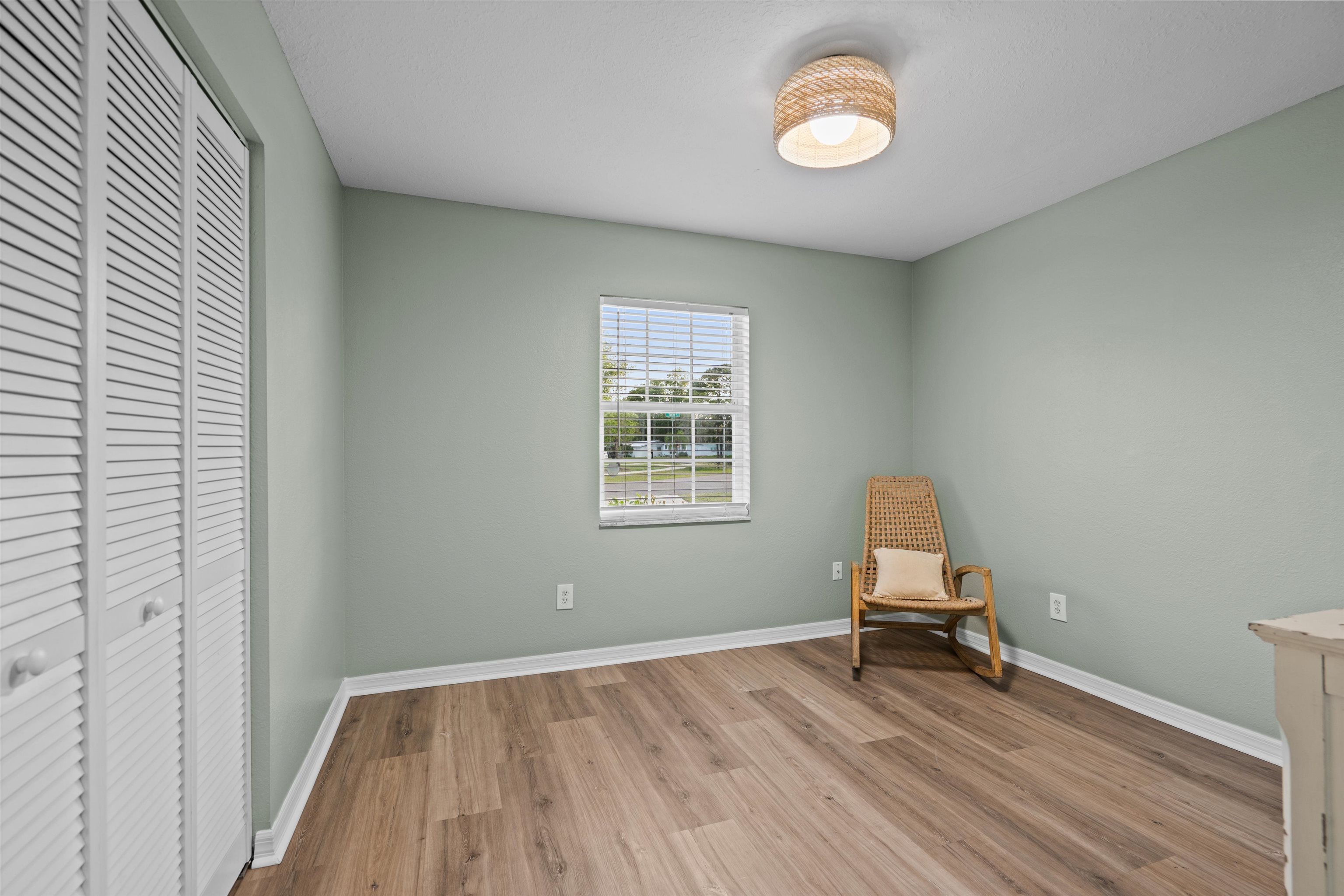 285 Trillo Street St. Augustine, FL 32086 - Photo 14 of 48 Unfurnished room featuring light wood finished floors and baseboards