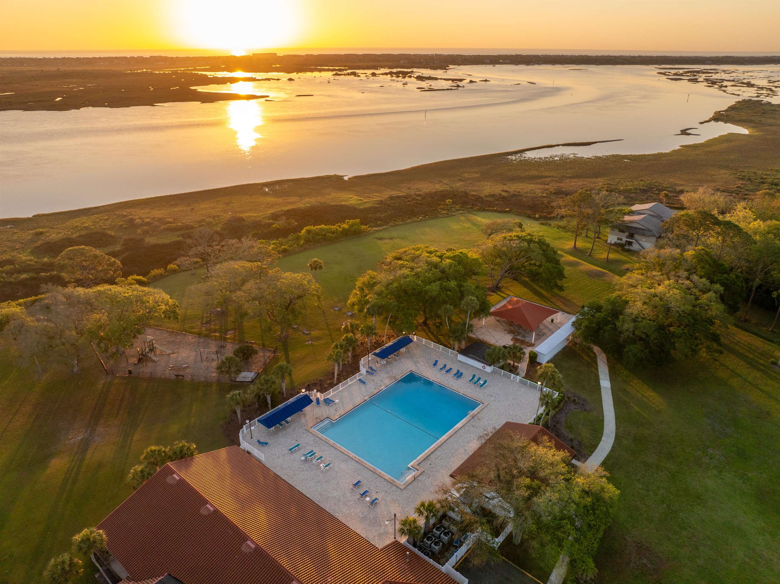 285 Trillo Street St. Augustine, FL 32086 - Photo 35 of 48 Aerial view at dusk of a water view and view of pool