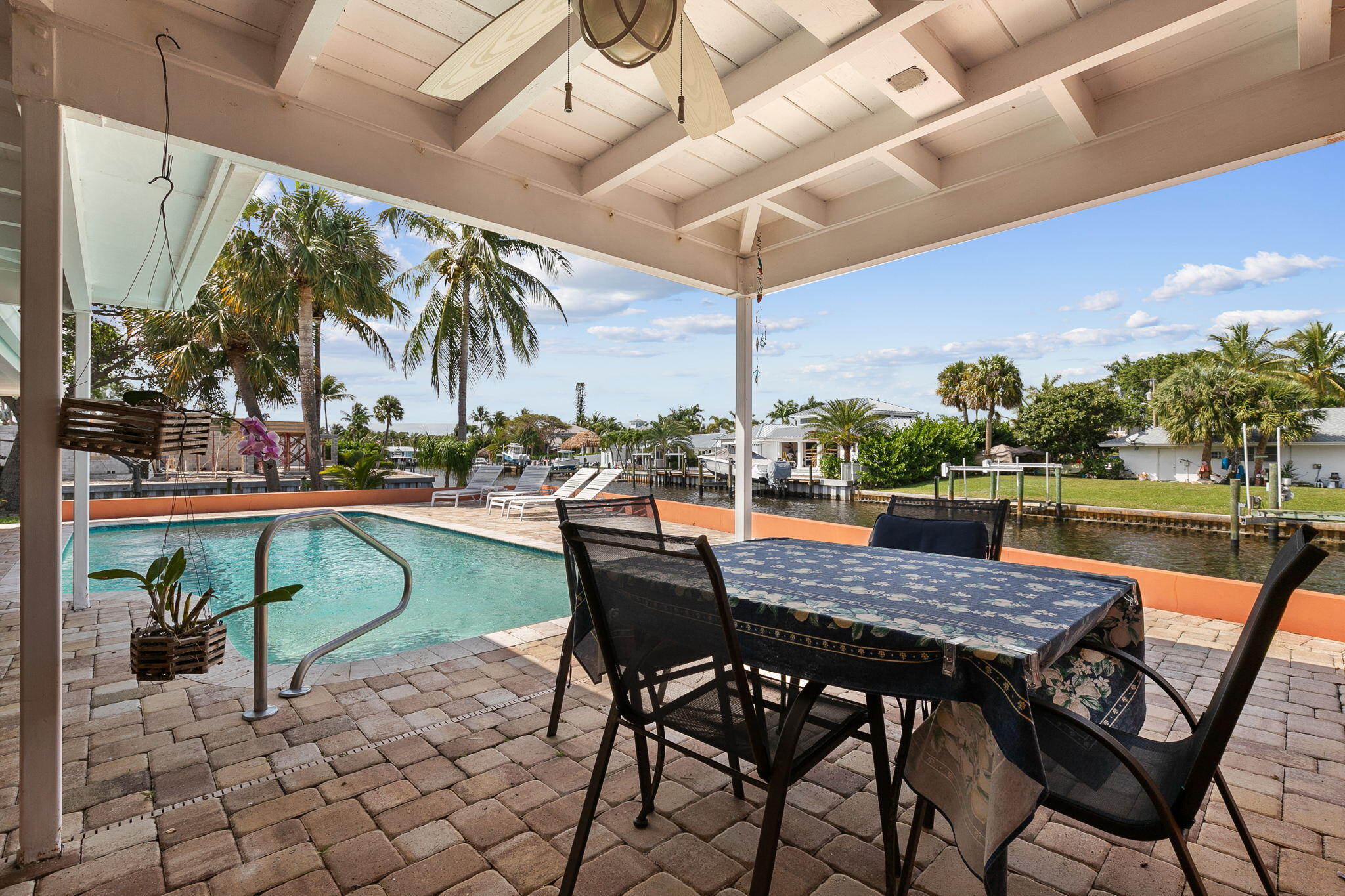 159 Gulfstream Drive Tequesta, FL 33469 - Photo 8 of 32 Covered Pool Area