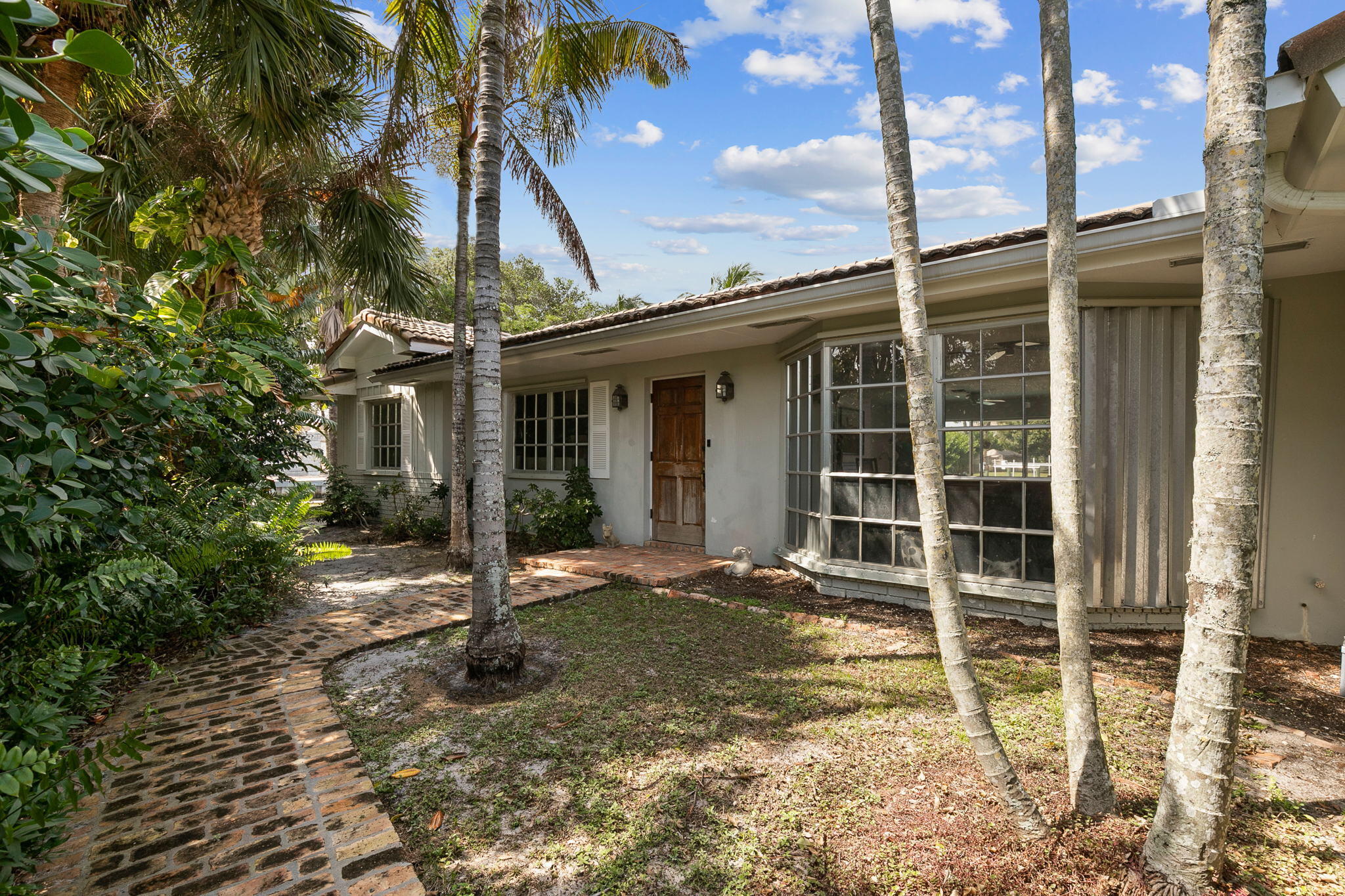159 Gulfstream Drive Tequesta, FL 33469 - Photo 9 of 32 Quaint Front Elevation