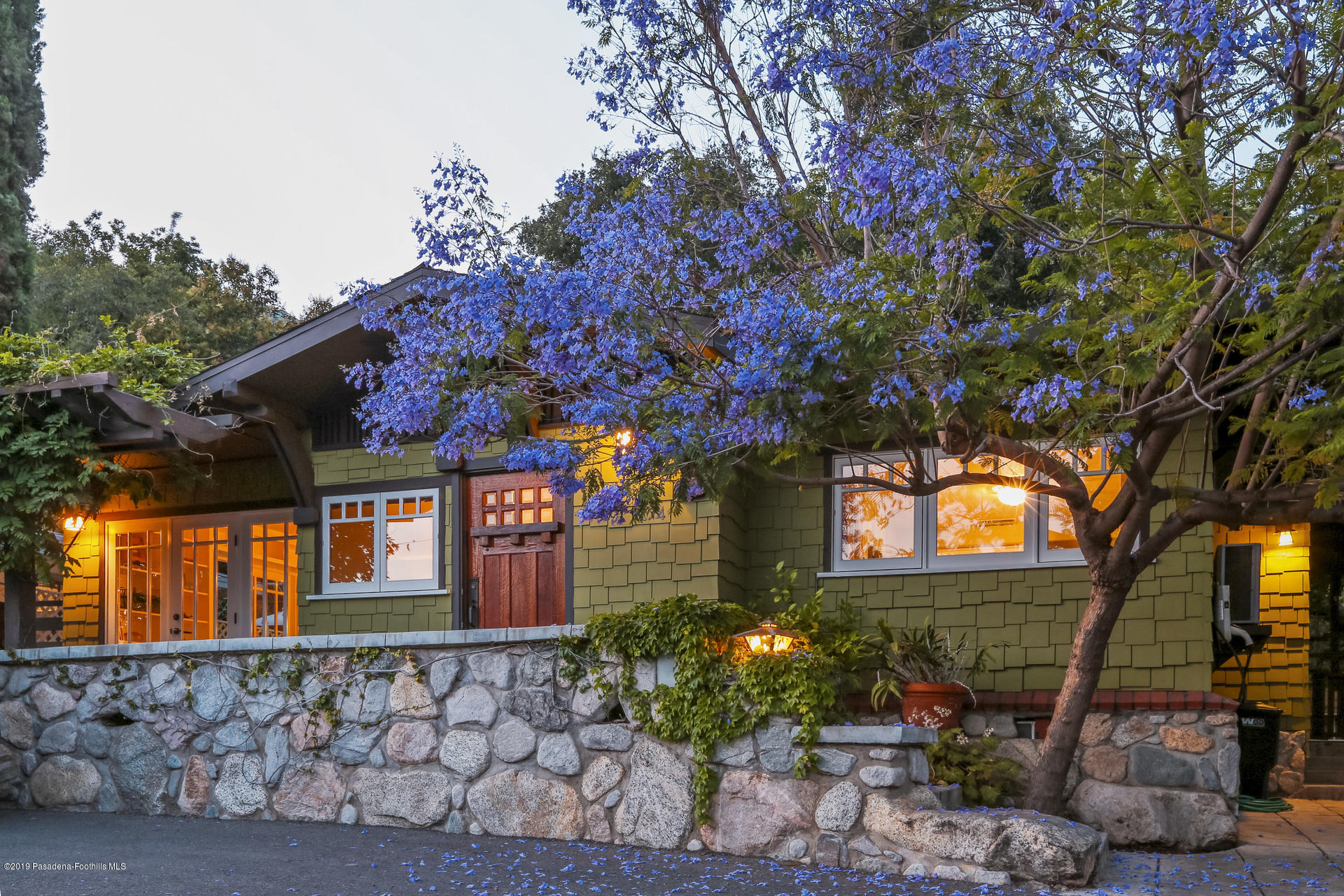 294 Old Ranch Road Sierra Madre, CA 91024 - Photo 1 of 27 a front view of a house with a garden
