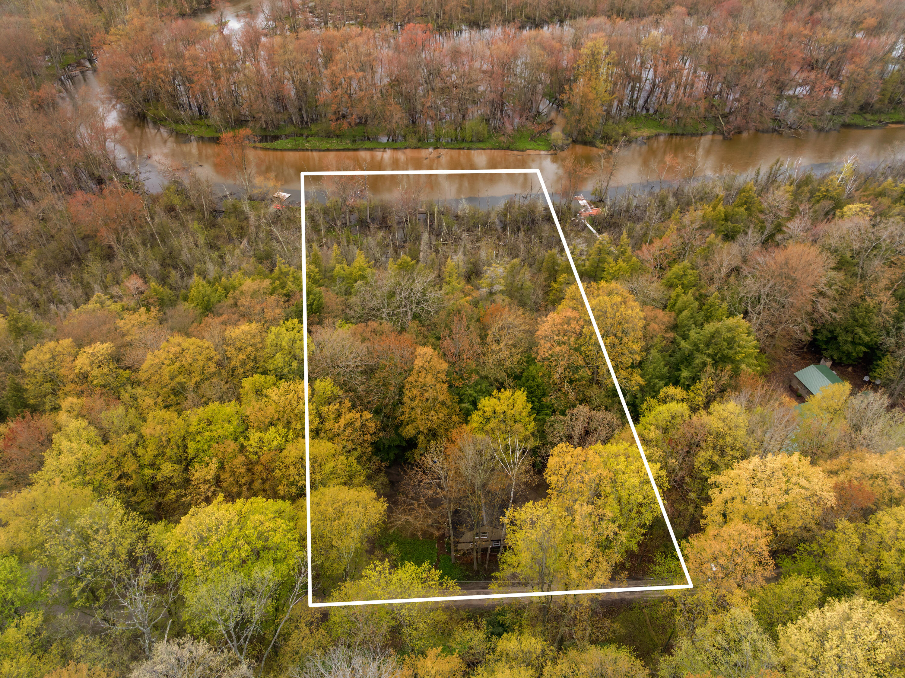 3513 River Road Frankfort, MI 49635 - Photo 3 of 35 DJI_20260513124142_0085_D