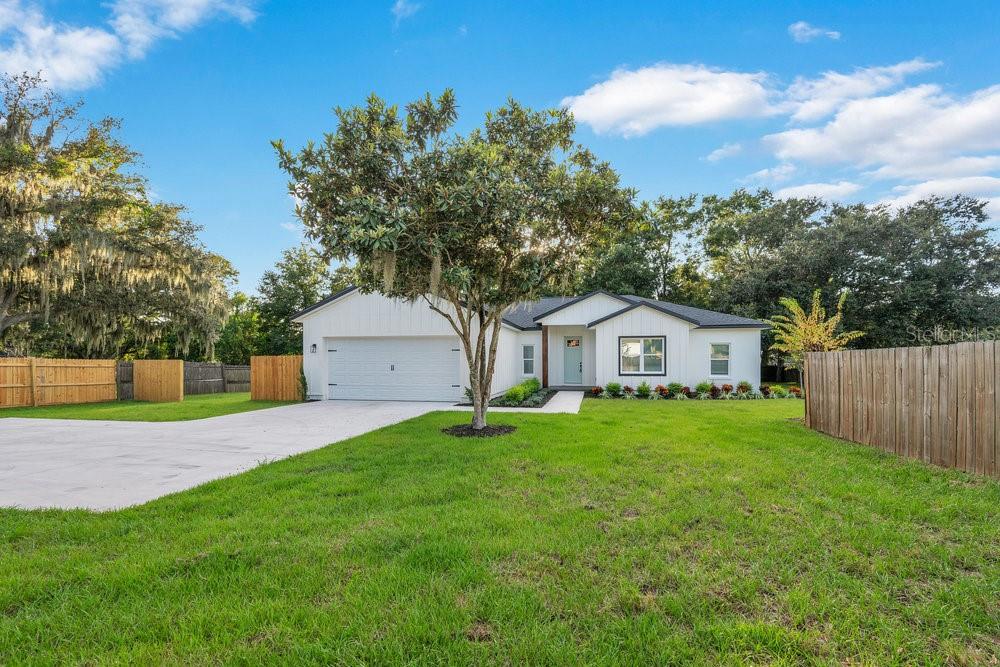4807 South Dossey Road Lakeland, FL 33811 - Photo 1 of 1 a house view with a garden space