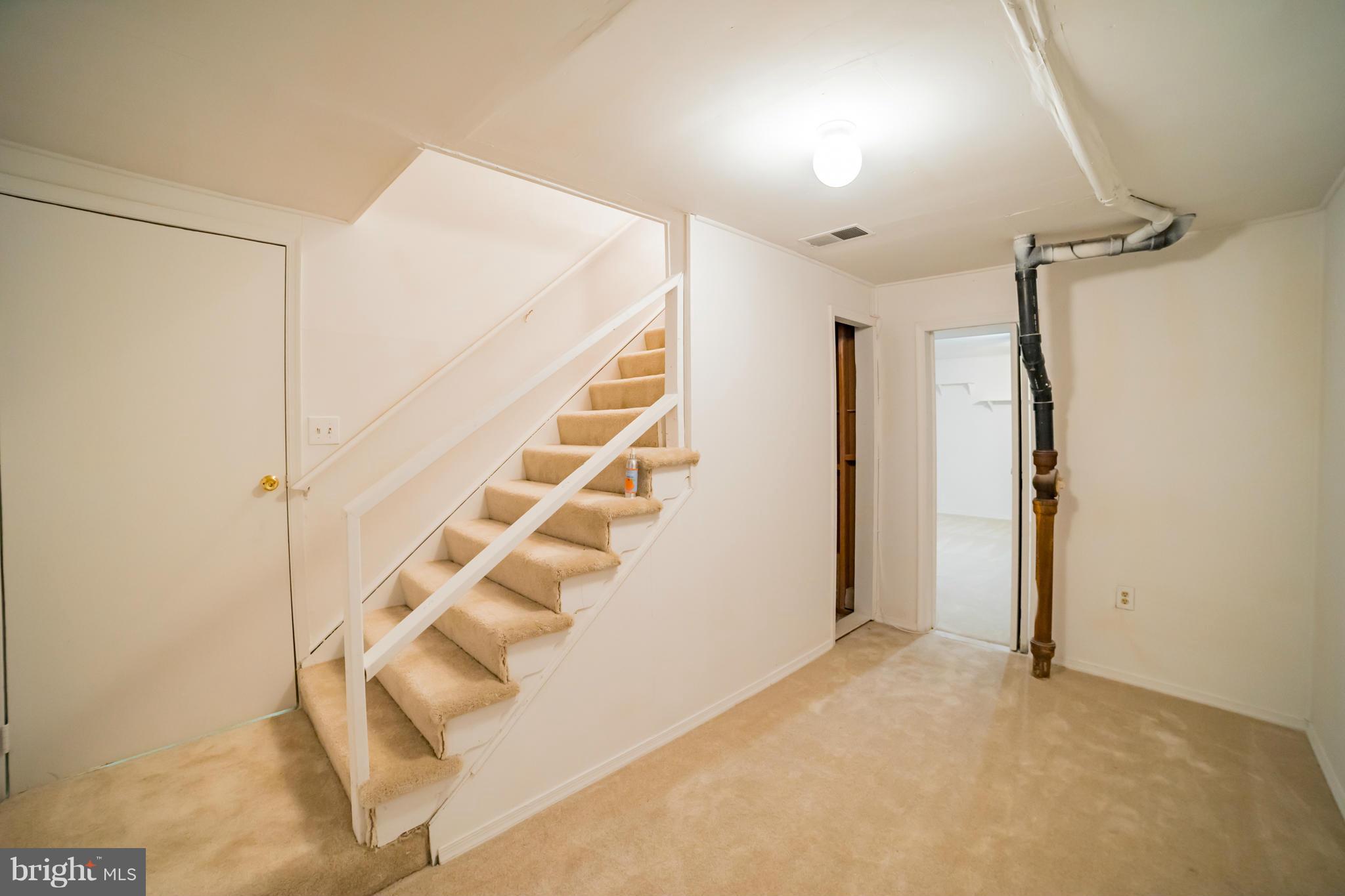 38 Oak Shade Road Gaithersburg, MD 20878 - Photo 18 of 22 Basement Stairway