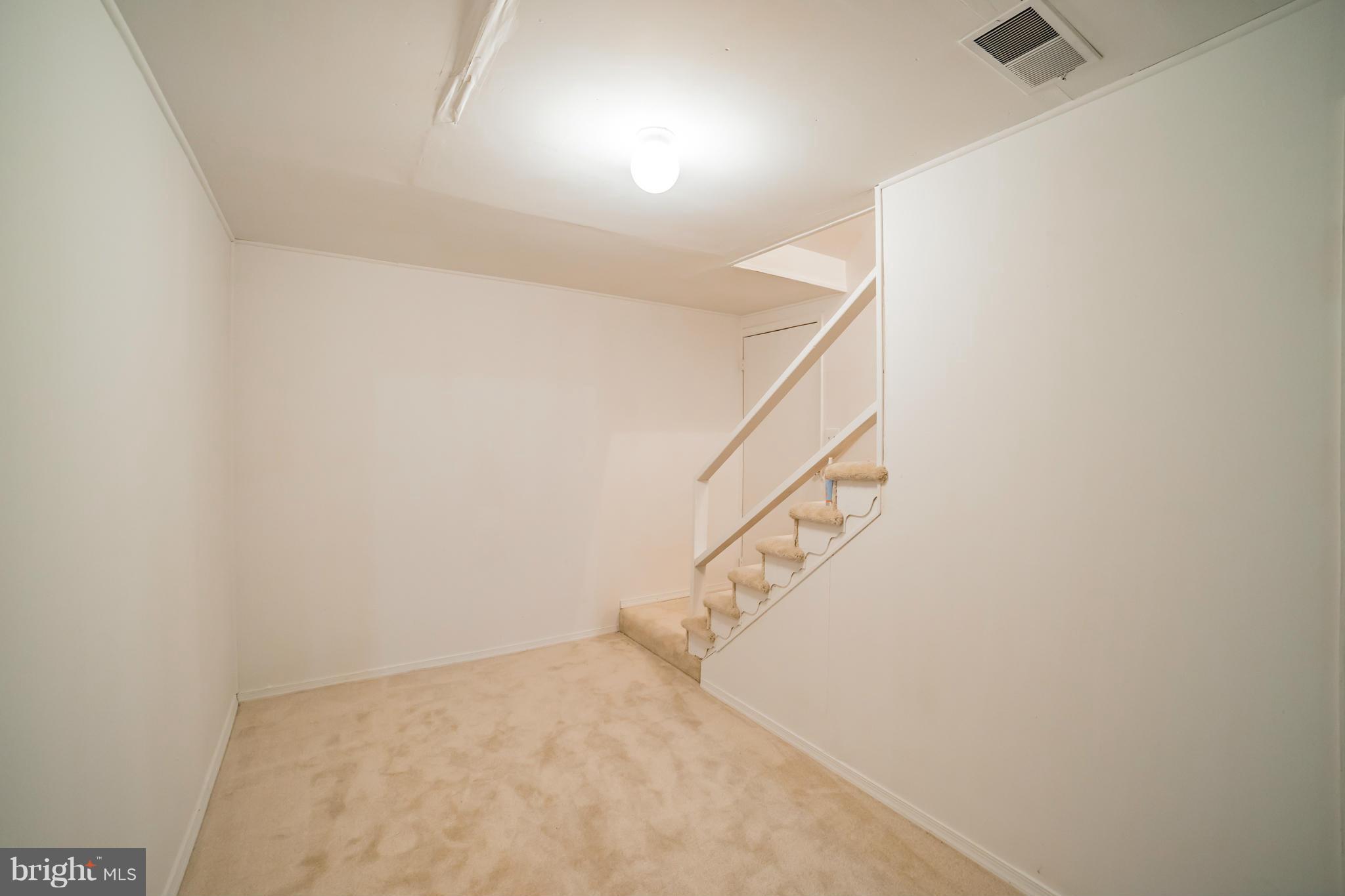 38 Oak Shade Road Gaithersburg, MD 20878 - Photo 19 of 22 Basement Room Off Stairs