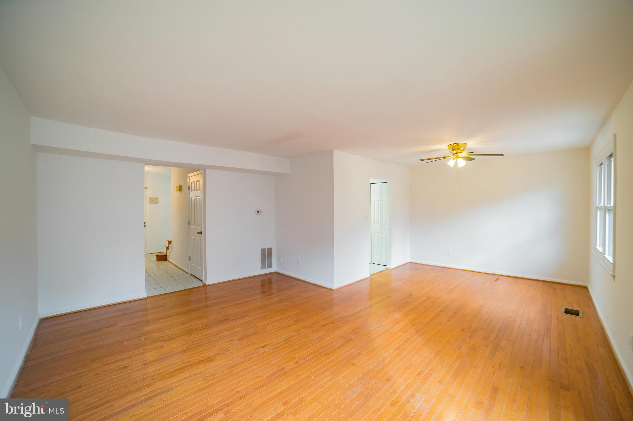 38 Oak Shade Road Gaithersburg, MD 20878 - Photo 5 of 22 Living Room Looking Back Towards Halll/Dining Area
