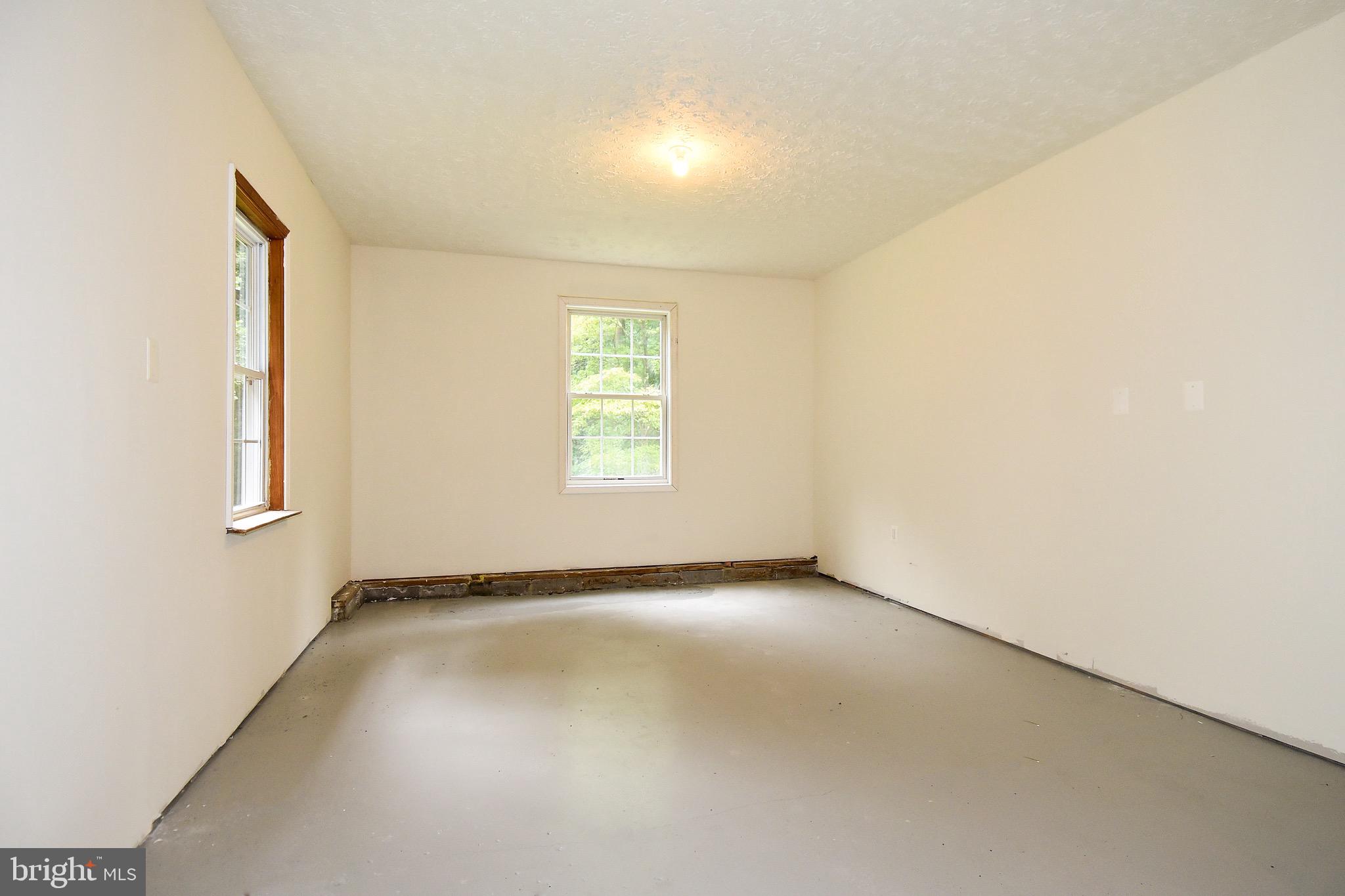 16245 Inheritance Drive Brandywine, MD 20613 - Photo 48 of 56 Finished workshop / storage in garage