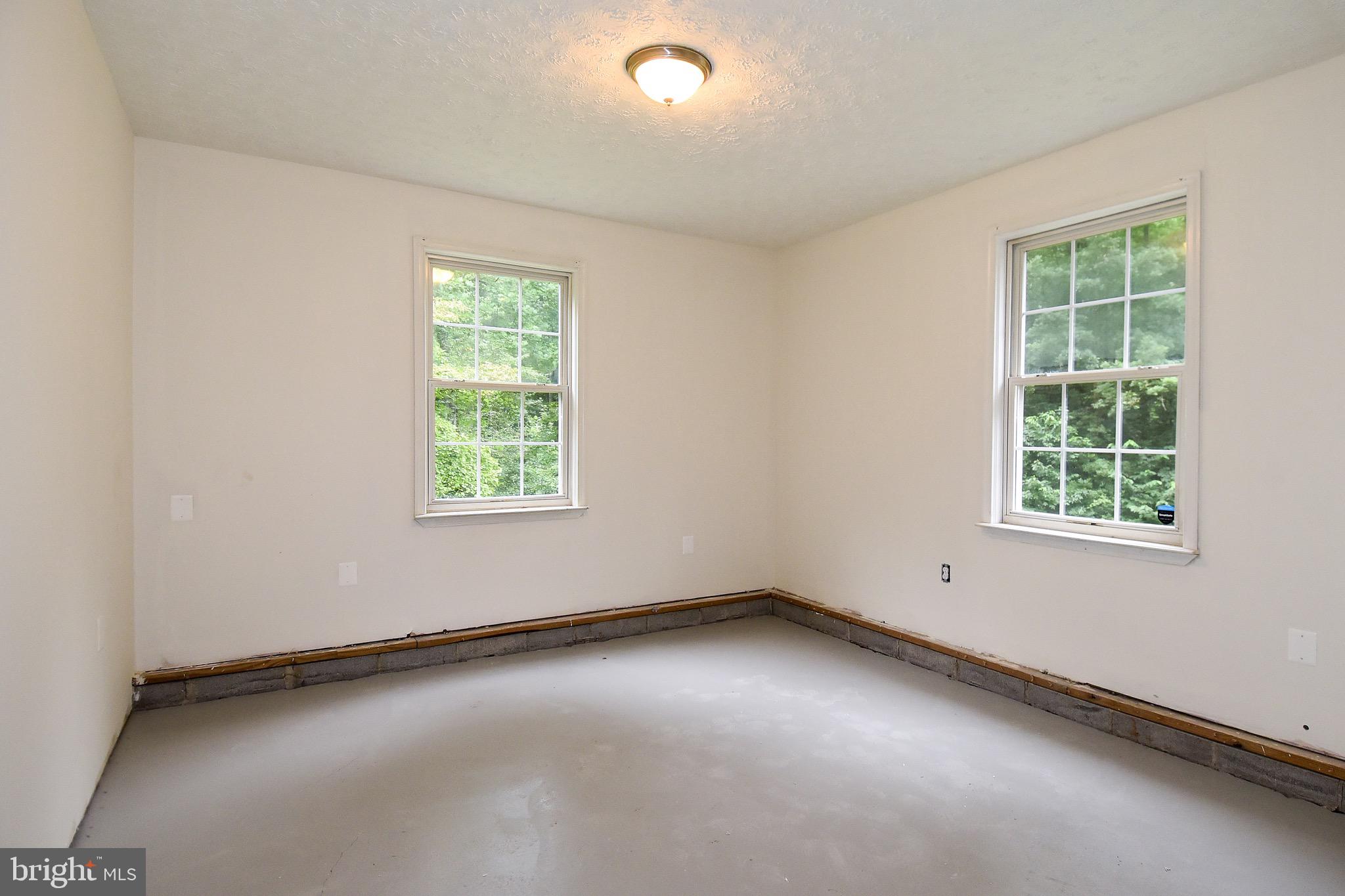 16245 Inheritance Drive Brandywine, MD 20613 - Photo 49 of 56 Finished workshop / storage in garage