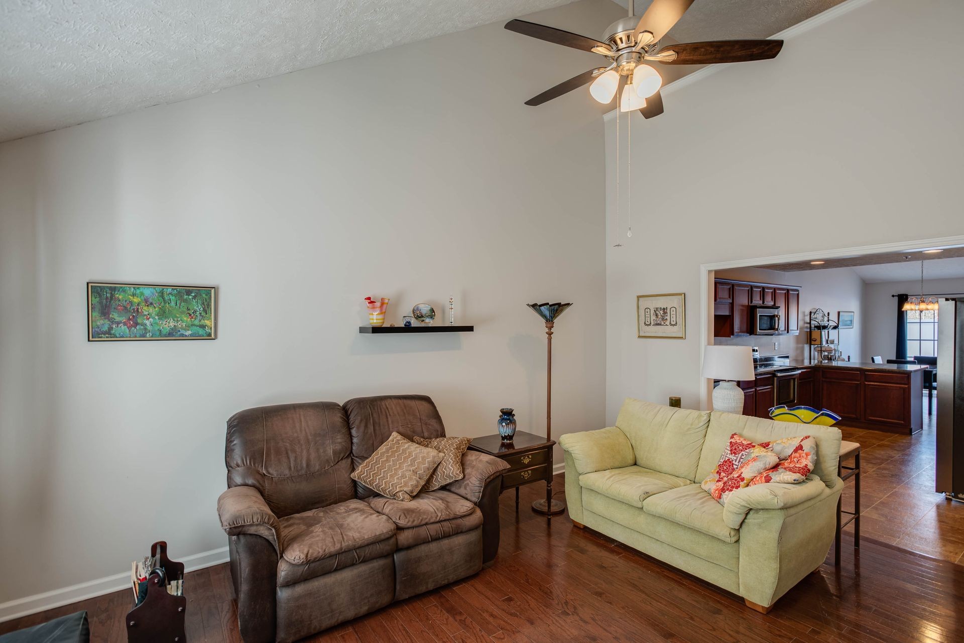 3057 Soaring Eagle Way Spring Hill, TN 37174 - Photo 2 of 32 a living room with furniture and a wooden floor