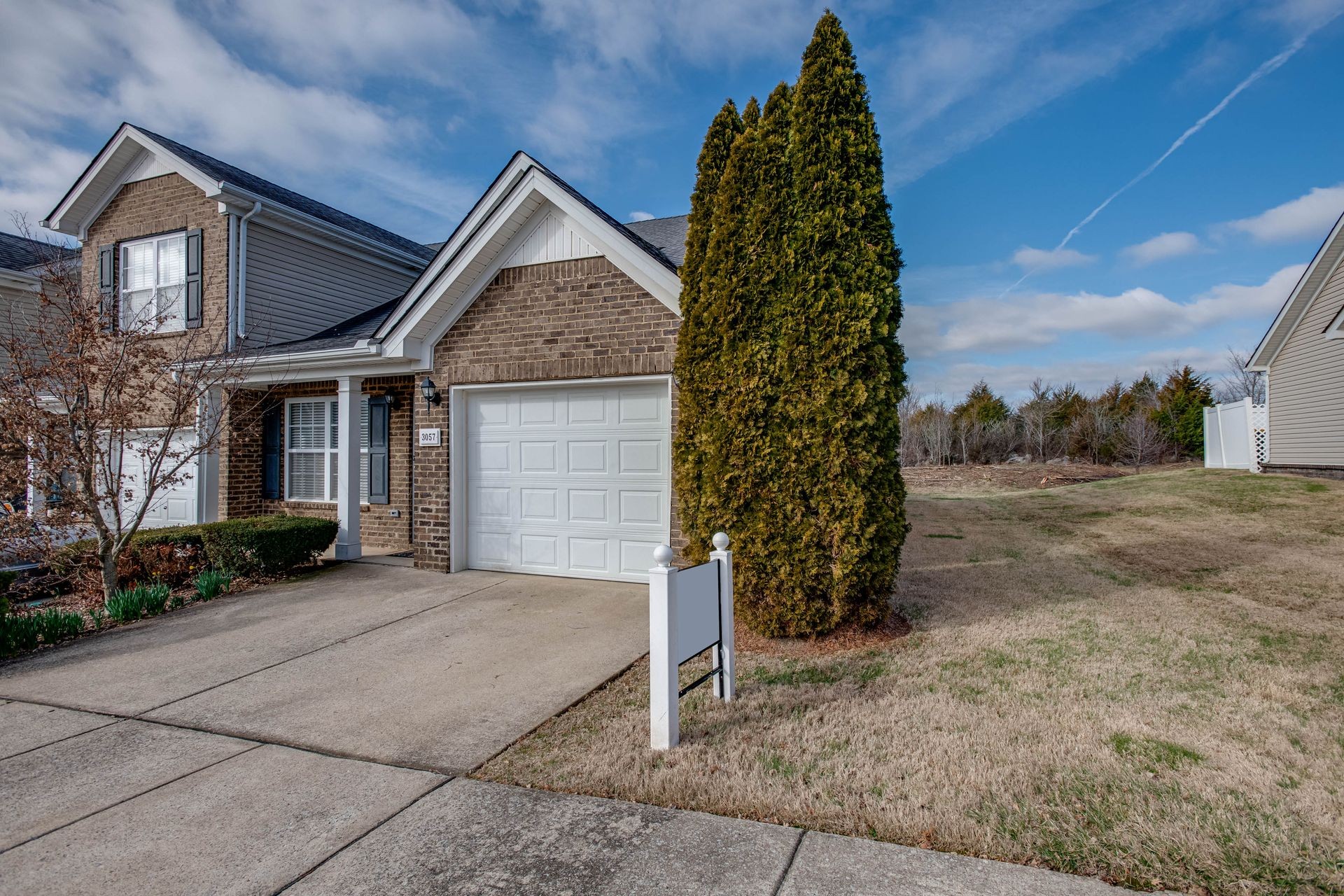 3057 Soaring Eagle Way Spring Hill, TN 37174 - Photo 28 of 32 front view of a house with a yard