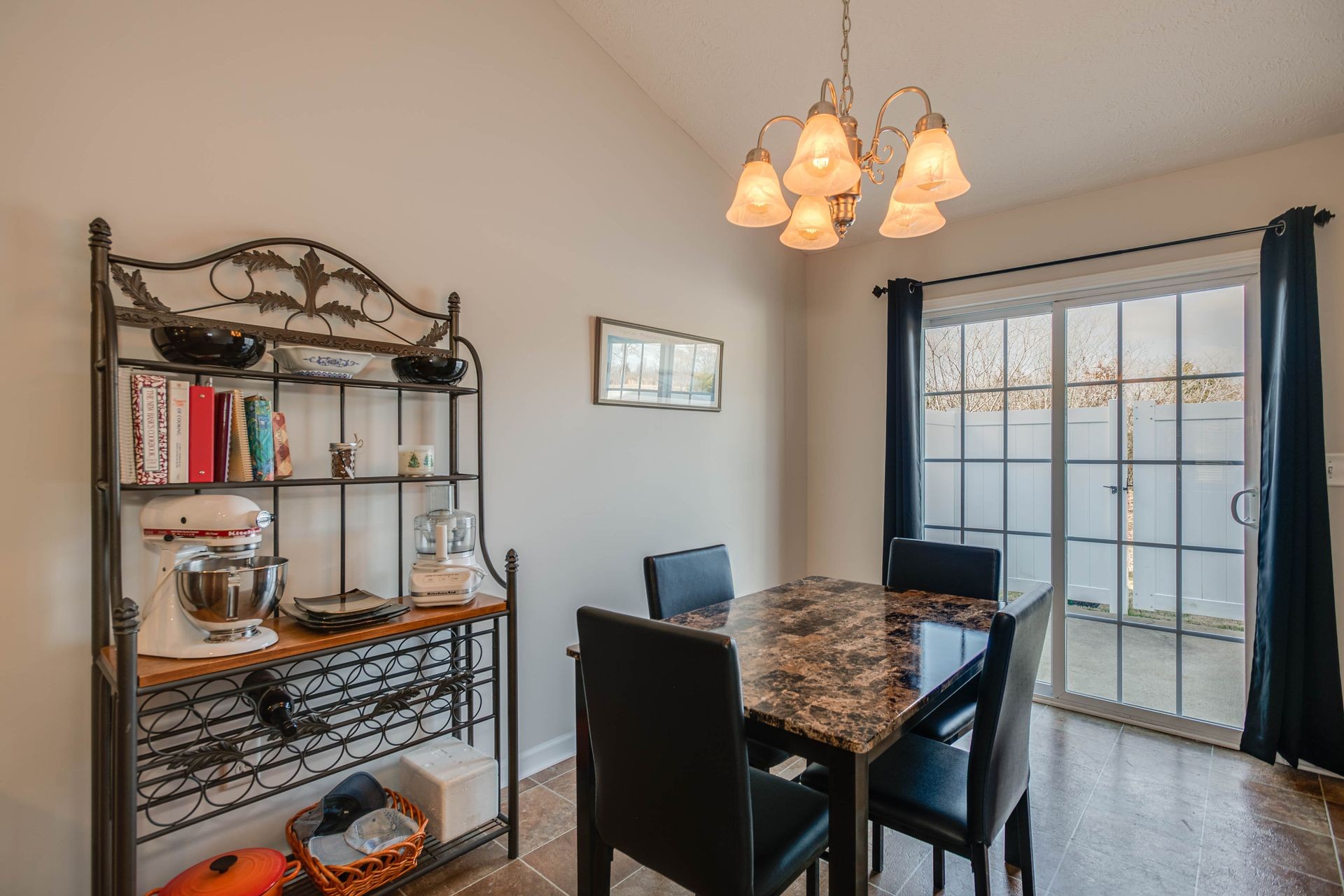 3057 Soaring Eagle Way Spring Hill, TN 37174 - Photo 10 of 32 a view of a dining room with furniture and chandelier