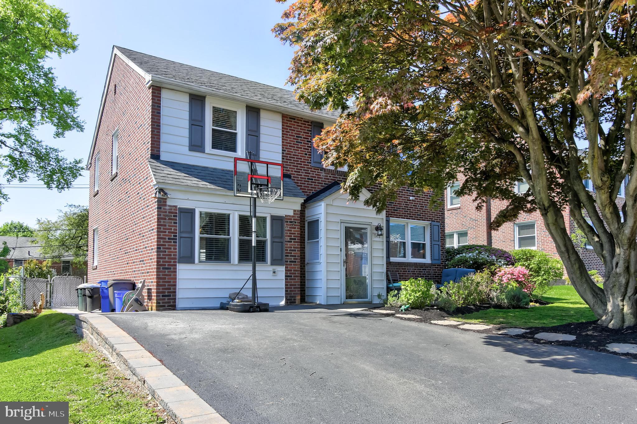 148 Signal Road Drexel Hill, PA 19026 - Photo 1 of 37 a front view of a house with a garden and plants