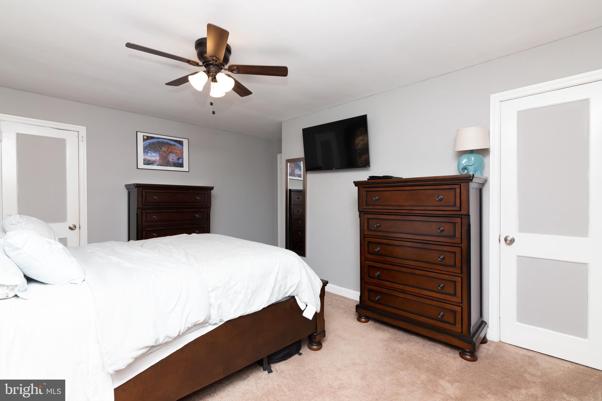 148 Signal Road Drexel Hill, PA 19026 - Photo 22 of 37 a bedroom with a bed and a television