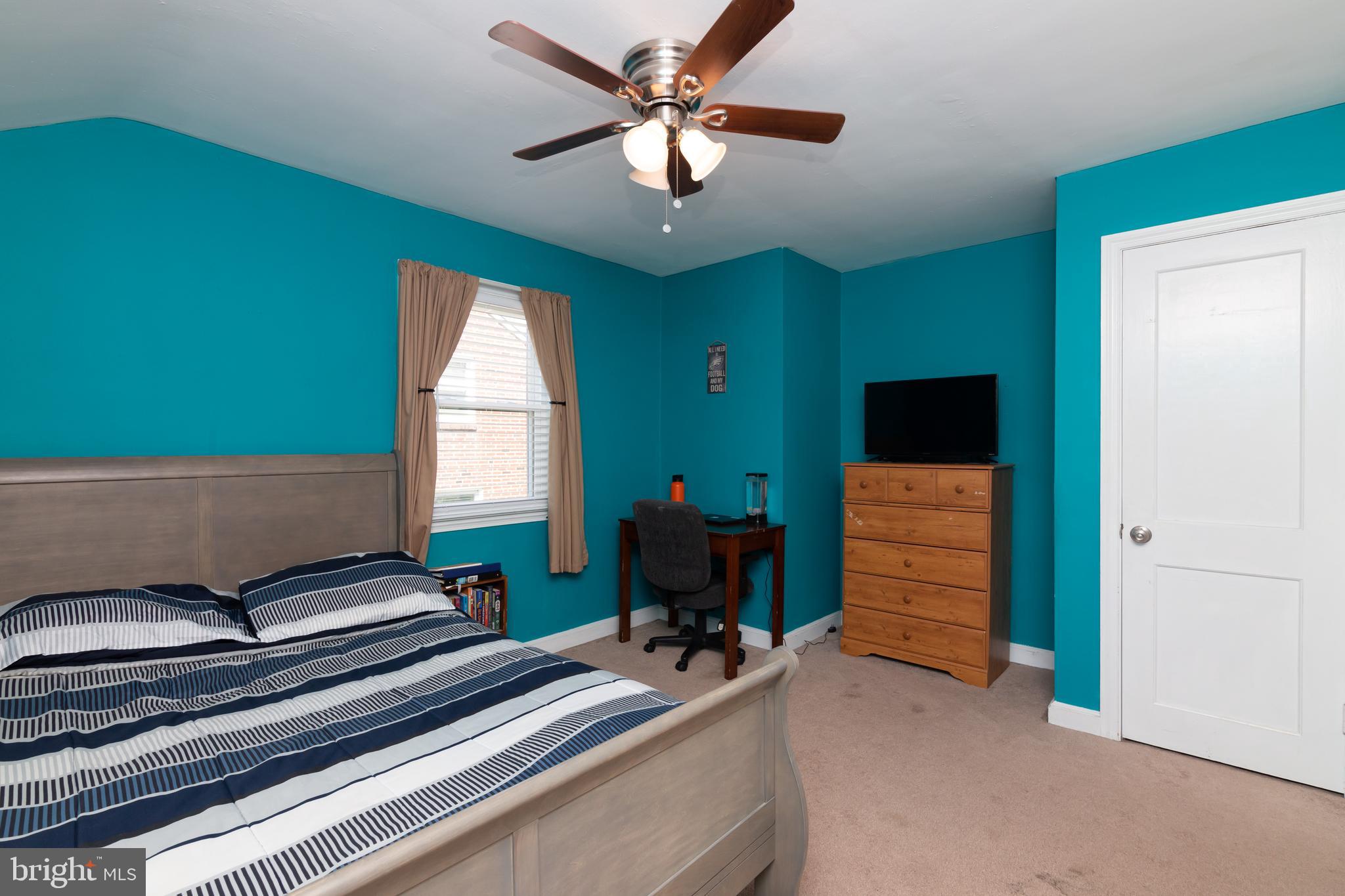 148 Signal Road Drexel Hill, PA 19026 - Photo 23 of 37 a living room with furniture and a chandelier