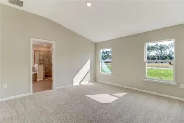 a view of a room with a large window