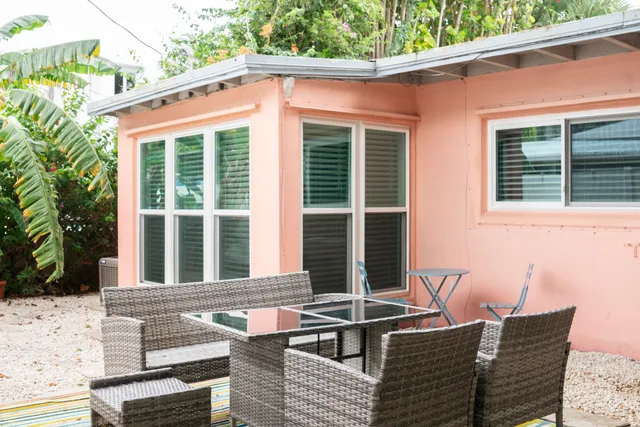 a backyard of a house with lots of green space