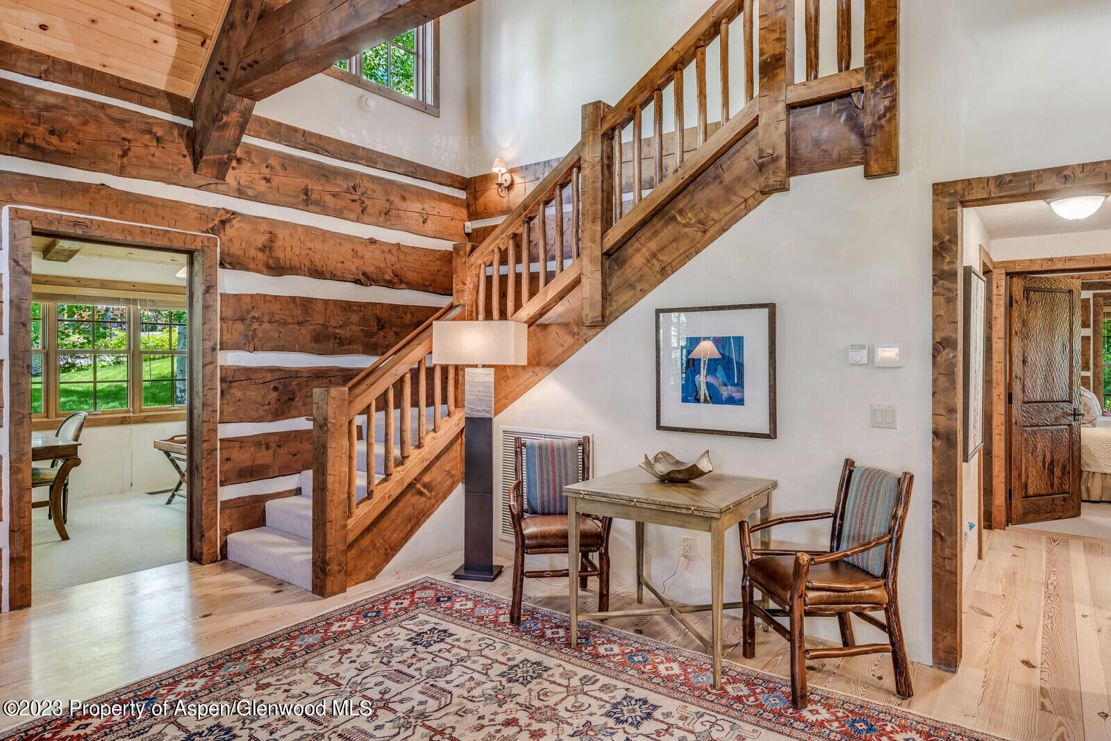 6 A Arbaney Ranch Road Basalt, CO 81621 - Photo 11 of 44 a dining room with wooden floor and a rug