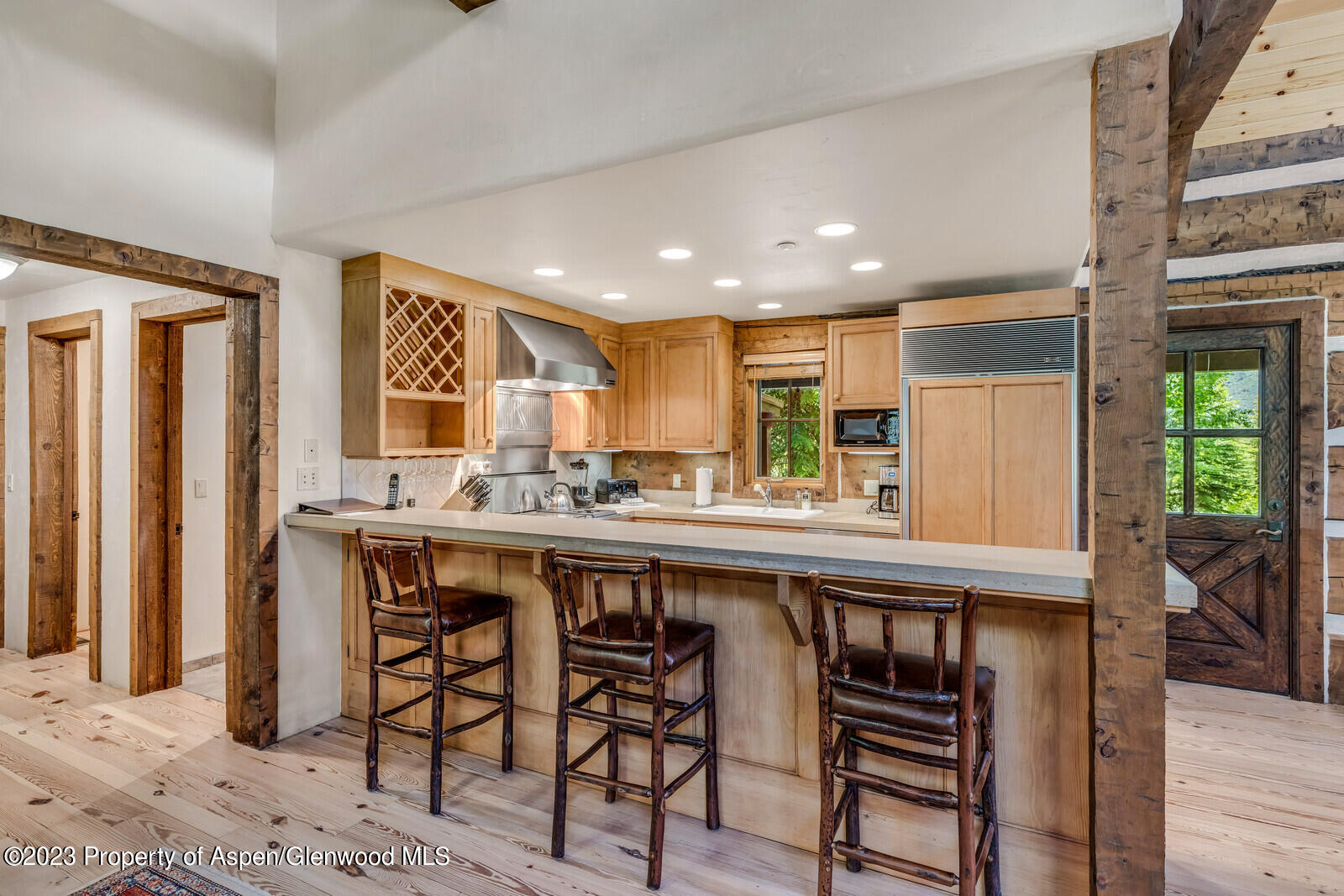 6 A Arbaney Ranch Road Basalt, CO 81621 - Photo 13 of 44 a kitchen with a table and chairs in it