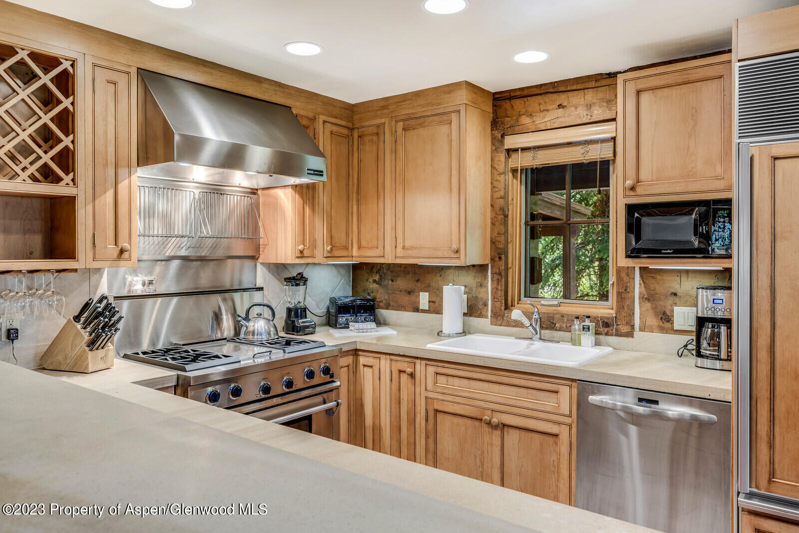6 A Arbaney Ranch Road Basalt, CO 81621 - Photo 14 of 44 a kitchen that has a sink and a stove in it