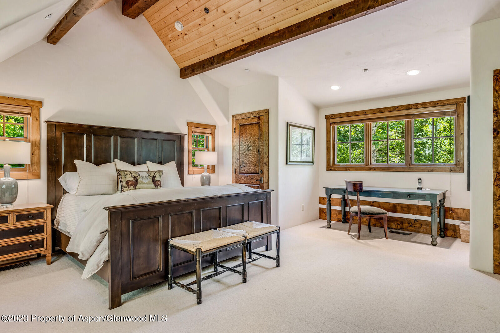 6 A Arbaney Ranch Road Basalt, CO 81621 - Photo 21 of 44 a bedroom with furniture and a table