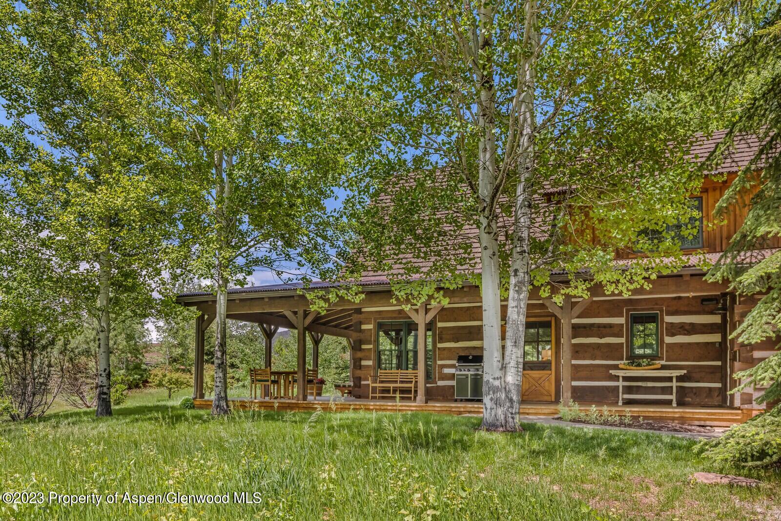 6 A Arbaney Ranch Road Basalt, CO 81621 - Photo 3 of 44 front view of house with a yard