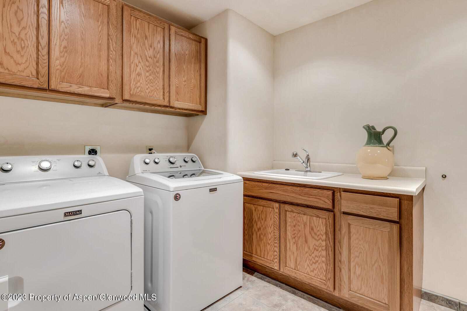 6 A Arbaney Ranch Road Basalt, CO 81621 - Photo 32 of 44 a utility room with dryer and washer