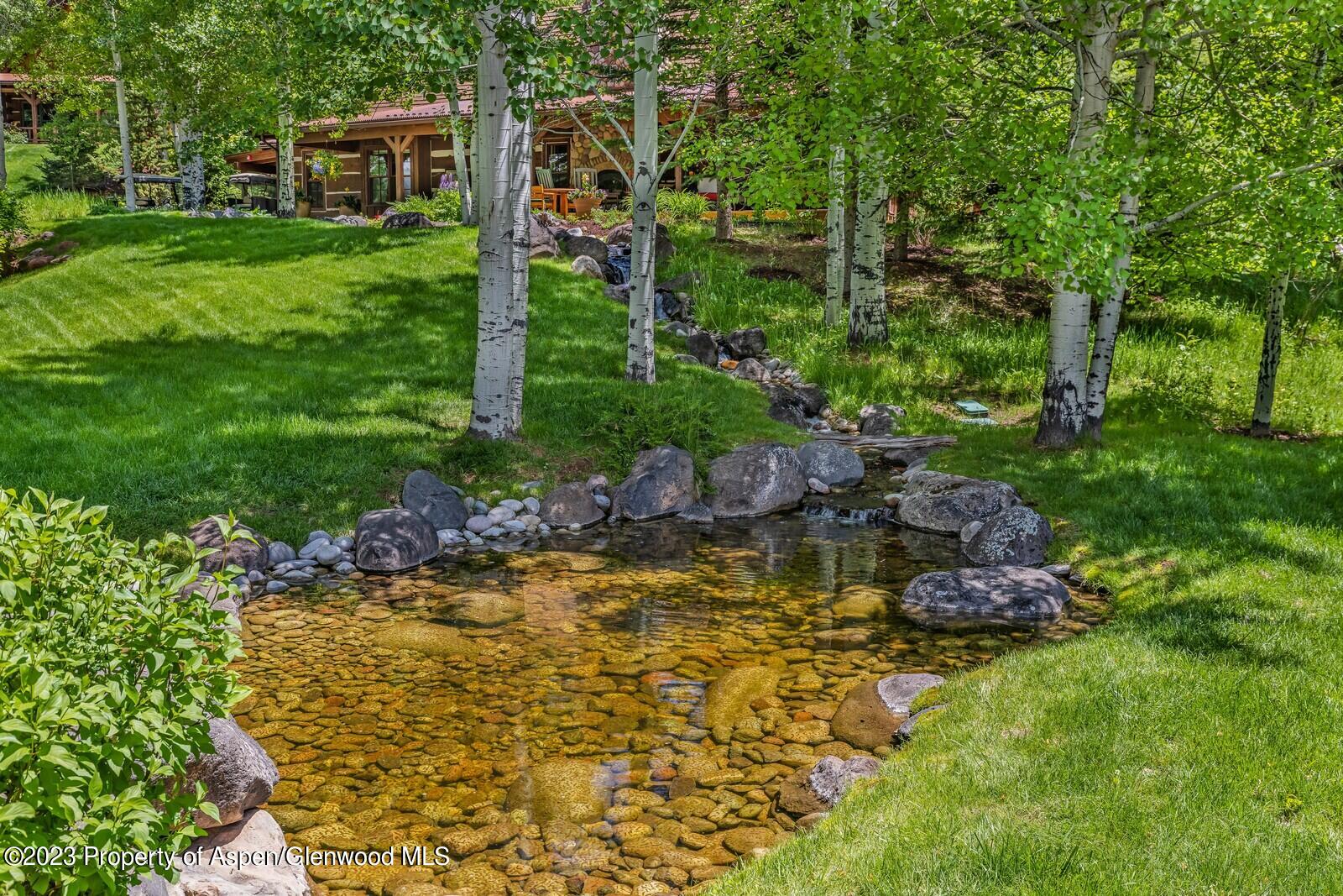6 A Arbaney Ranch Road Basalt, CO 81621 - Photo 39 of 44 a garden view with a seating space