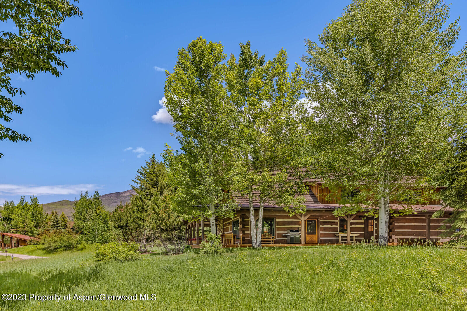 6 A Arbaney Ranch Road Basalt, CO 81621 - Photo 40 of 44 a view of a house with a yard