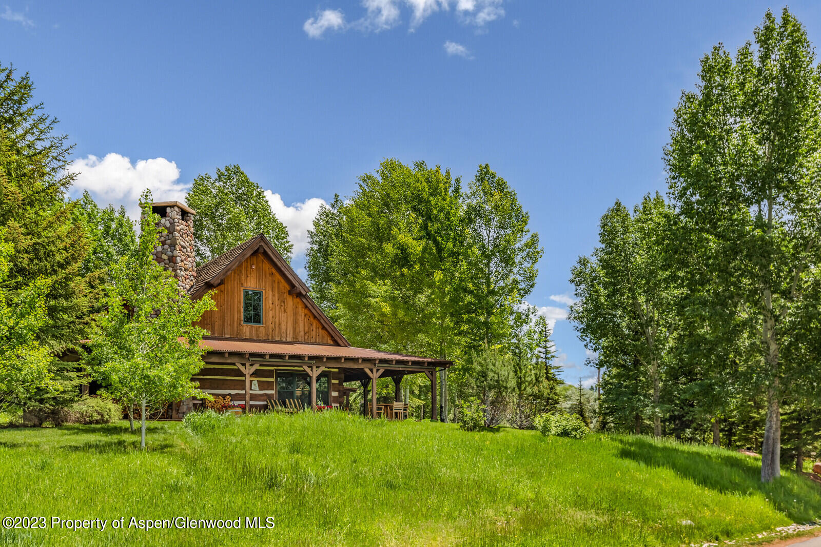 6 A Arbaney Ranch Road Basalt, CO 81621 - Photo 4 of 44 a view of a house with a yard