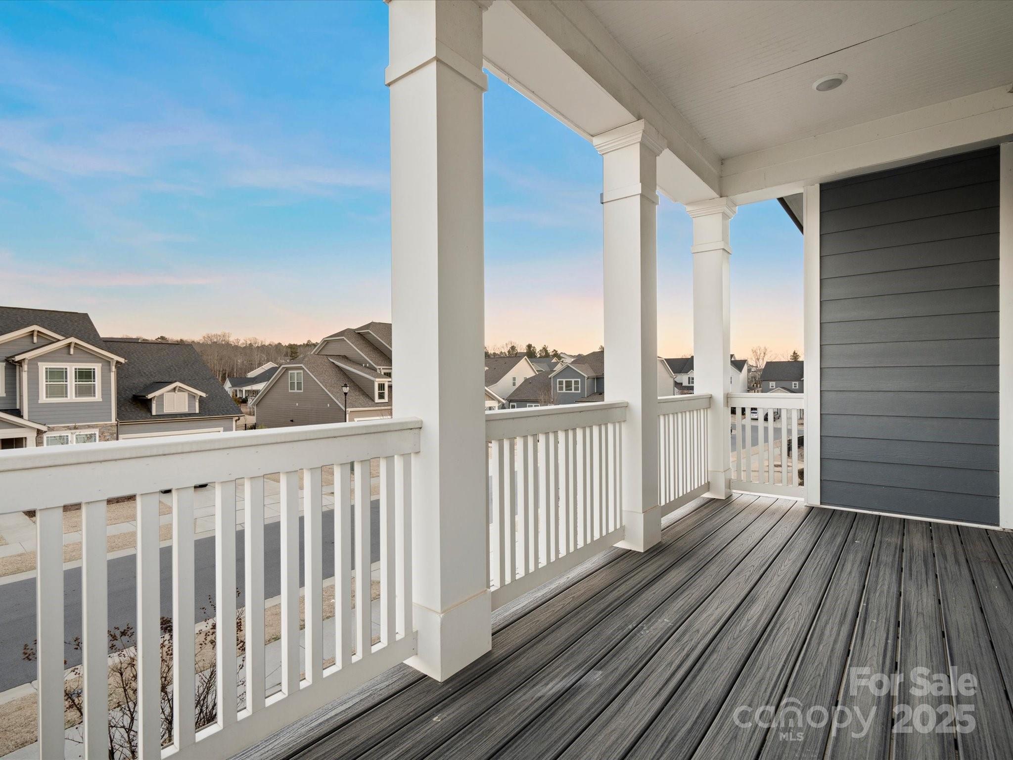 523 Rock Skip Way Fort Mill, SC 29708 - Photo 29 of 48 a view of a balcony with wooden floor